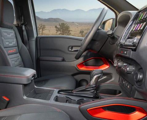 View of the front seats in a 2022 Nissan Frontier
