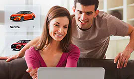Couple shopping for Nissan cars online from home