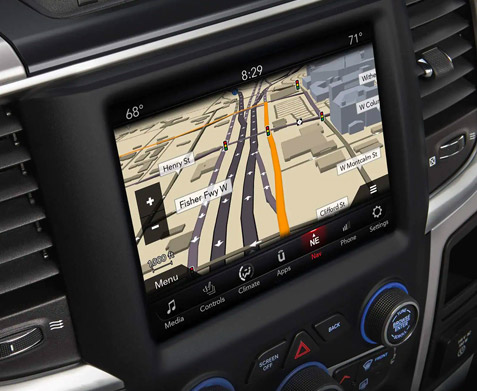 Display The touchscreen in the 2022 Ram 1500 Classic, displaying a navigation map of the surrounding area onscreen.