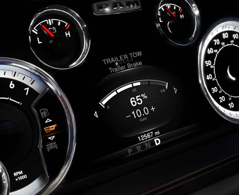 Display The Driver Information Digital Cluster Display in the 2022 Ram 1500 Classic, with trailer tow trailer brake information displayed.