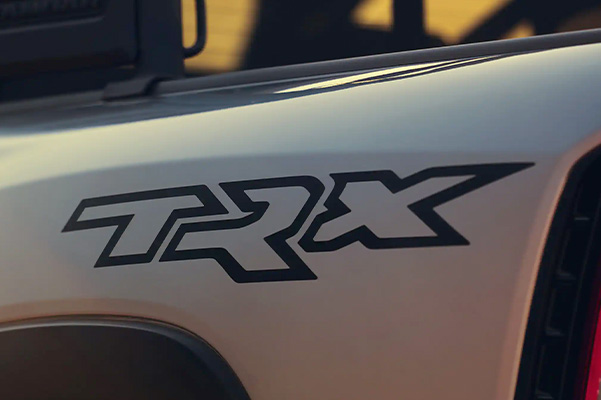 A close-up of the TRX logo on the exterior of the 2022 Ram TRX.