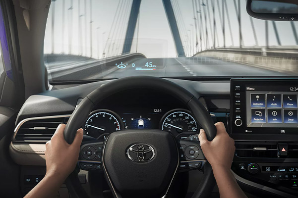 Driving the 2022 Toyota Camry with speed projected on the windshield