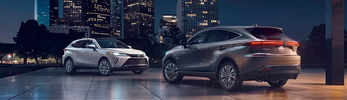 2022 Toyota Venza Limited shown in Blizzard Pearl, and Limited shown in Coastal