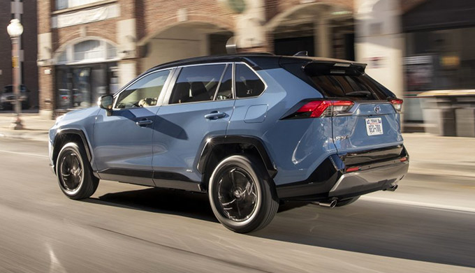 Rear view of blue 2022 Toyota RAV4 Hybrid