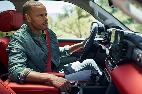 TRD Pro CrewMax interior shown in Cockpit Red. Prototype shown with options.