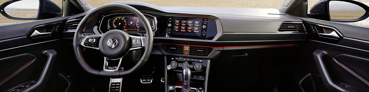 Interior dashboard view of the Jetta GLI shown in available Titan Black leather.