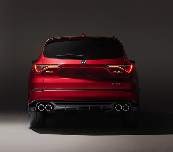 Rear view of the 2023 MDX parked in a lot