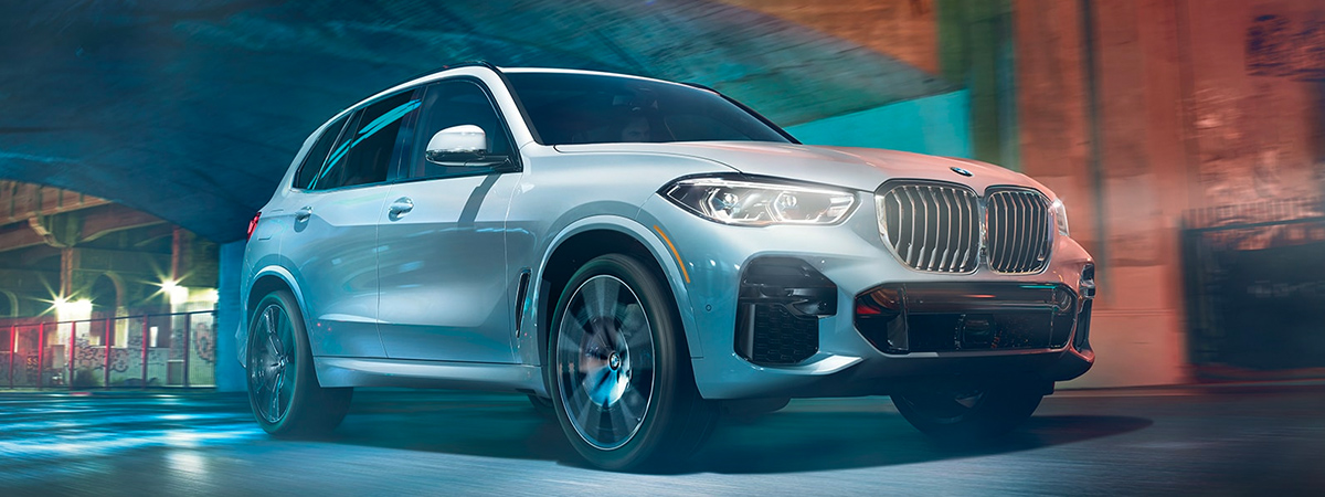 2023 BMW X5 driving on a road