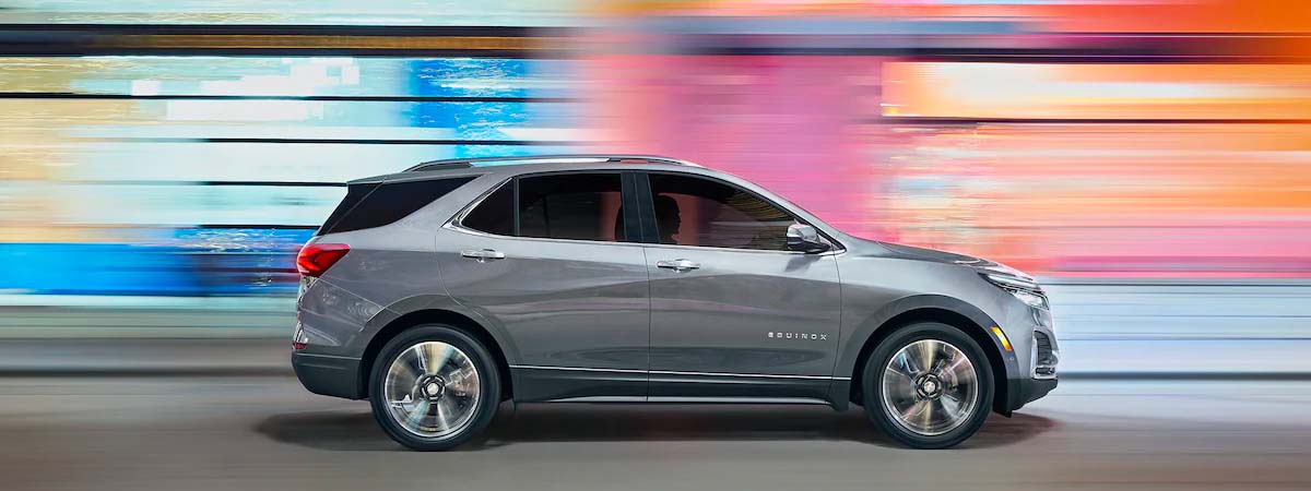 Side profile of a 2023 Chevrolet Equinox in action