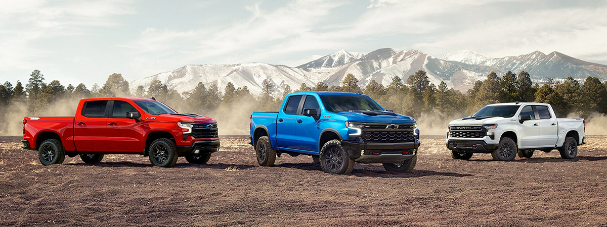 Three 2023 Chevrolet Silverado 1500 Parked Side By Side