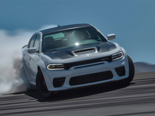 2023 Dodge Charger on racetrack speeding 