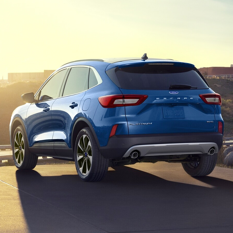 2023 Ford Escape parked along an overlook of an urban area.