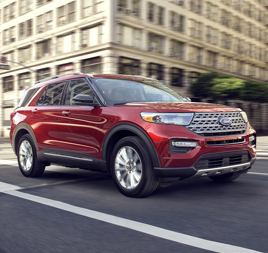 Ford Explorer driving down the road