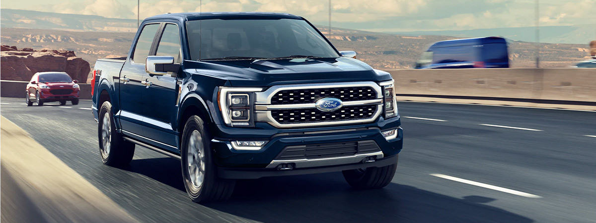 A 2023 Ford F-150® being driven on a highway