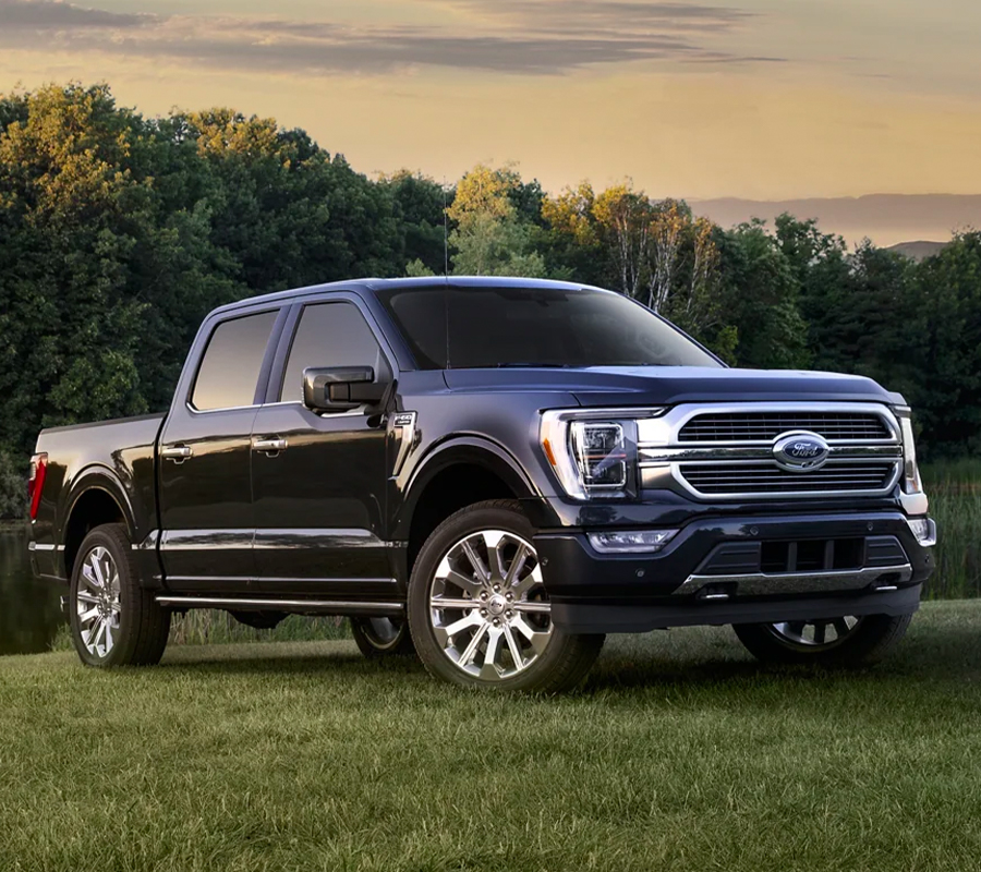 2023 Ford F-150 parked off road with a scenic background