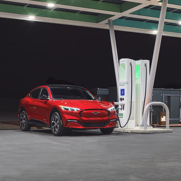 Two 2023 Ford Mustang Mach-E® parked at a charging station
