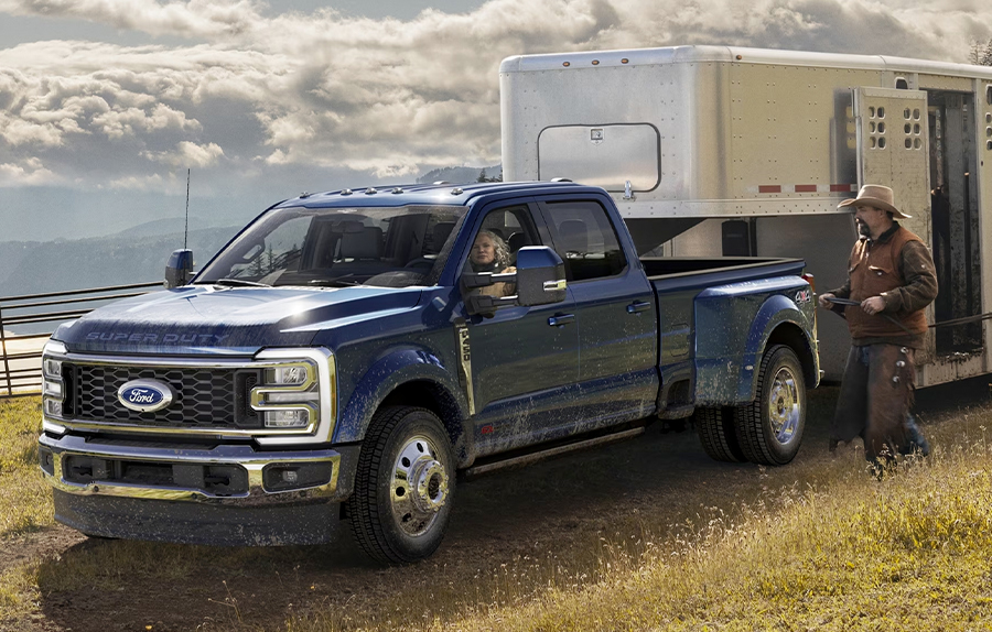 2023 Ford Super Duty® F-450® King Ranch® DRW hitched to a horse trailer