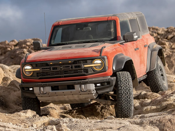 The 2023 Ford Bronco driving on rocky terrain