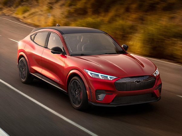 The 2023 Ford Mustang Mach-E driving down the highway