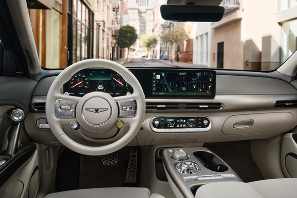 Interior shot of a 2023 Genesis GV60 steering wheel.