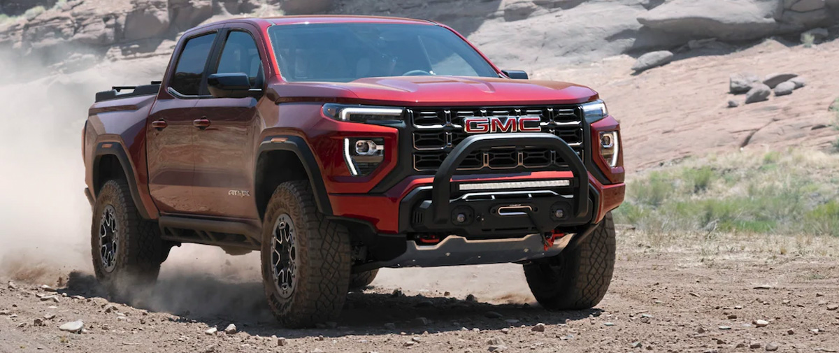 2023 GMC Canyon driving through a desert road