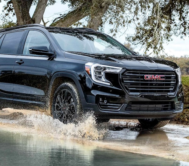 Marine Metallic GMC Terrain SLT Driving Off-Road through Water and Mud