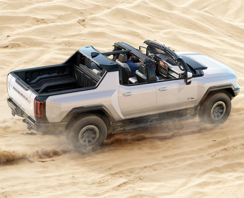 New GMC HUMMER EV driving through the desert