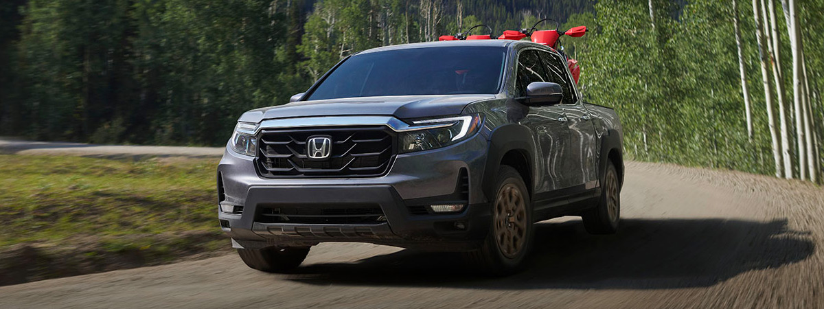 Front view of Honda Ridgeline driving on road
