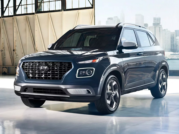 2023 Hyundai Venue blue parked in warehouse