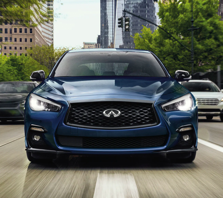 Front profile view of a blue 2023 INFINITI Q50 Luxury Sedan