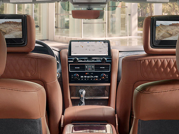 Interior of 2023 INFINITI QX80 highlighting rear seat dual 8 inch entertainment screens