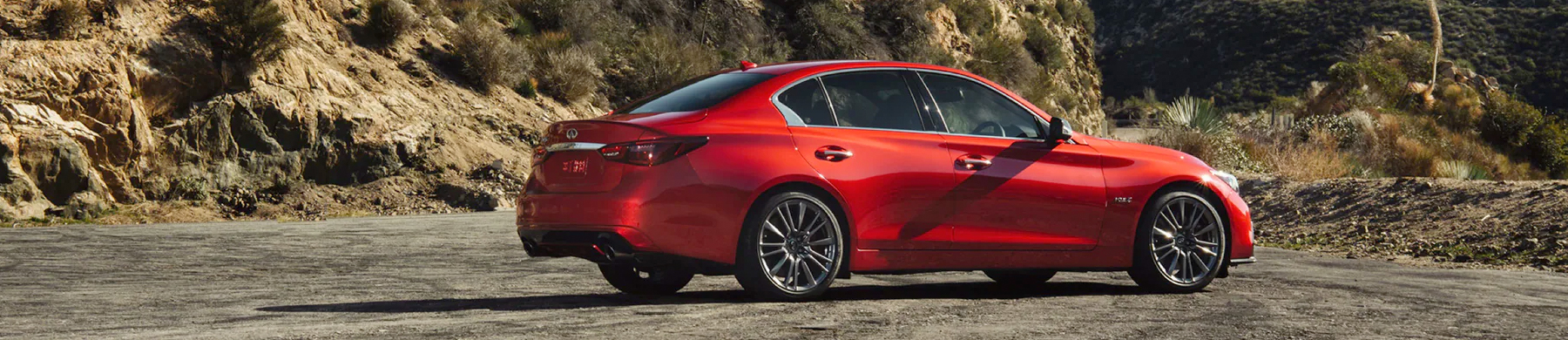 INFINITI InTouch Safety, Convenience, and Remote Services | Red INFINITI Q50 Equipped with INFINITI InTouch