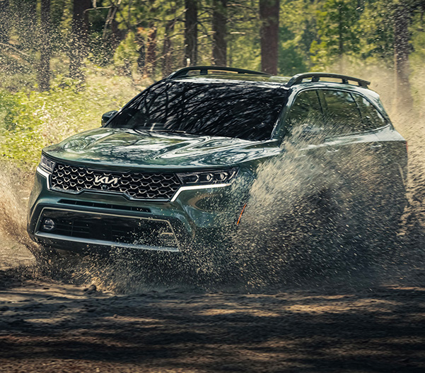 2023 Kia Sorento X-Line Driving Off Road Through Mud In A Forest