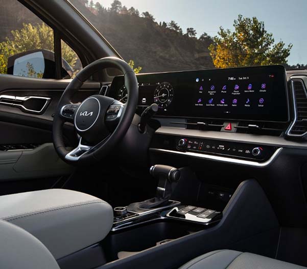 Interior shot of a 2023 Kia Sportage with 12.3 inch touchscreen navigation