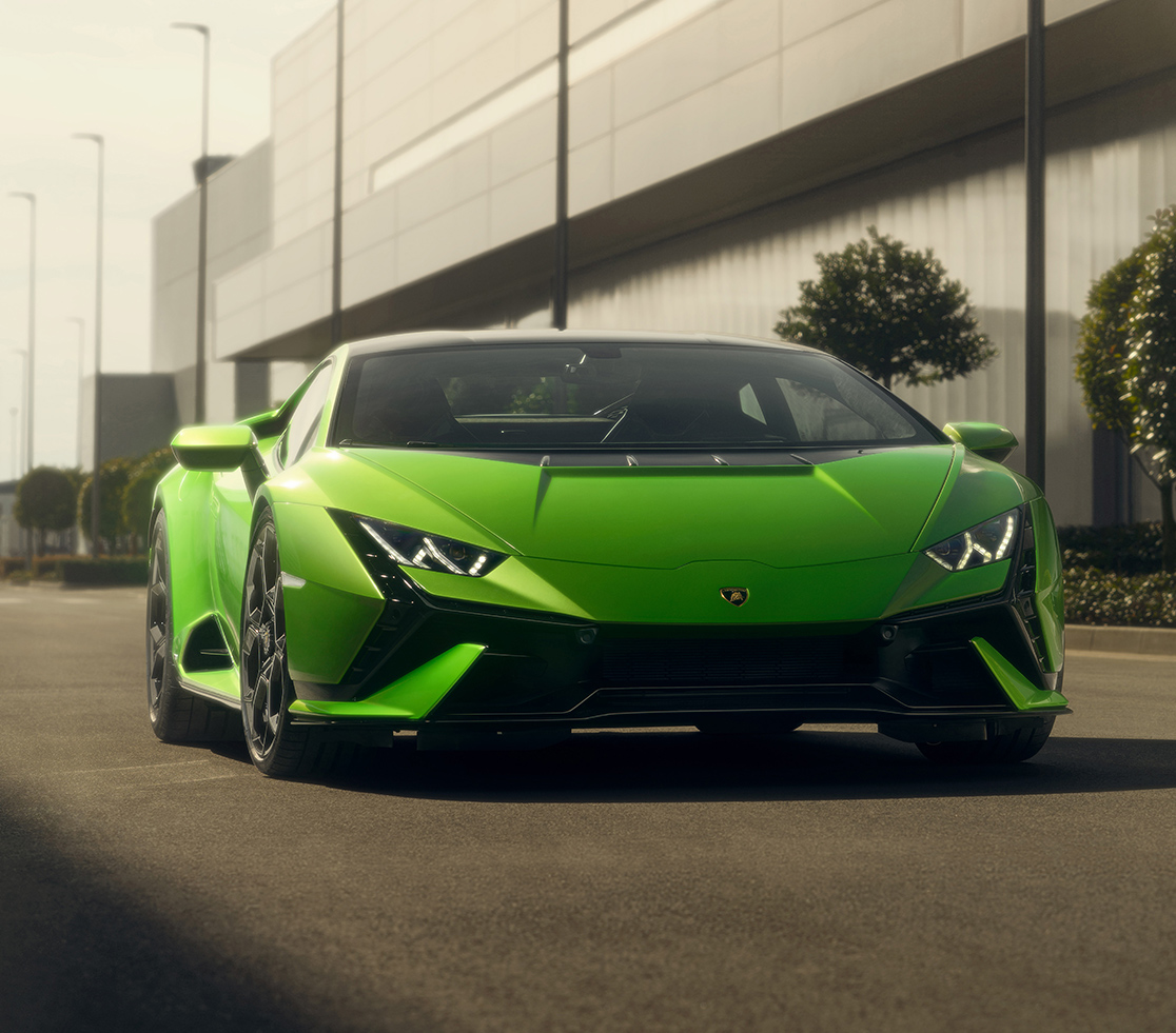 2023 Lamborghini Huracán Tecnica driving down a road