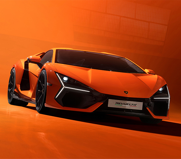 Exterior shot of an orange 2023 Lamborghini Revuelto on a full clean orange background.