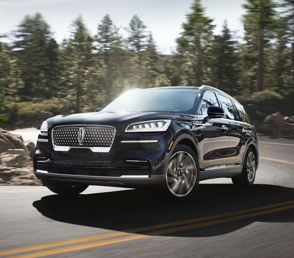 2023 Lincoln Aviator driving along a rural highway