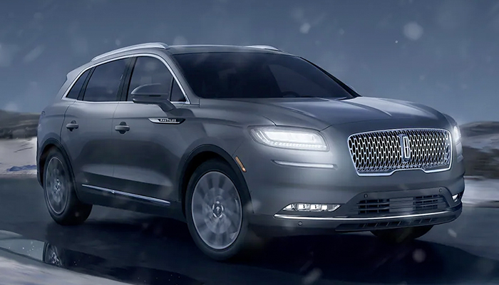 A 2023 Lincoln Nautilus® SUV is driven on a snowy road