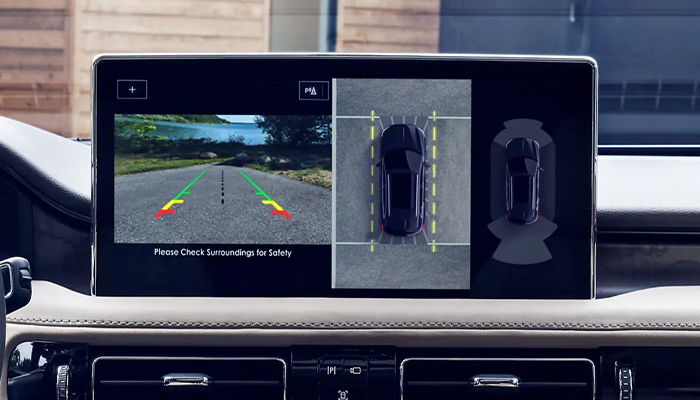 A 360 degree camera birds eye view is displayed on the center touchscreen inside a 2023 Lincoln Nautilus® SUV