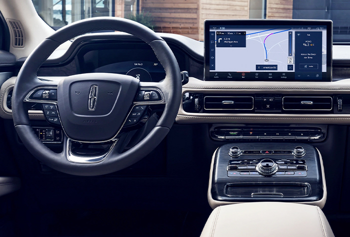 The slate interior of a 2023 Lincoln Nautilus® SUV shows off comfortable amenities