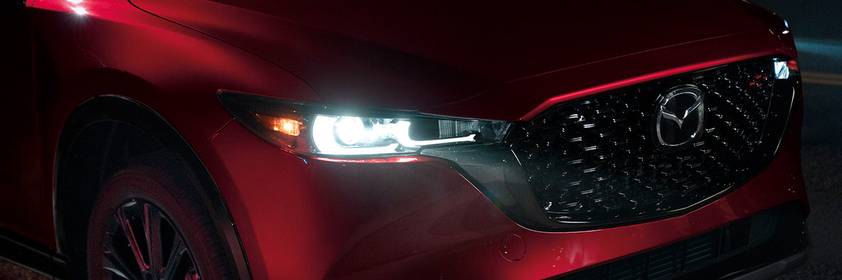 Close up of the front grille and headlights of the 2023 Mazda CX-5
