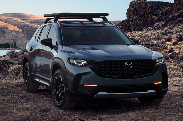 2023 Mazda CX-50 parked on dirt countryside
