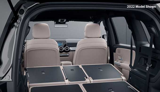 View inside the opened trunk of the 2022 Mercedes-Benz GLB with the back seats down