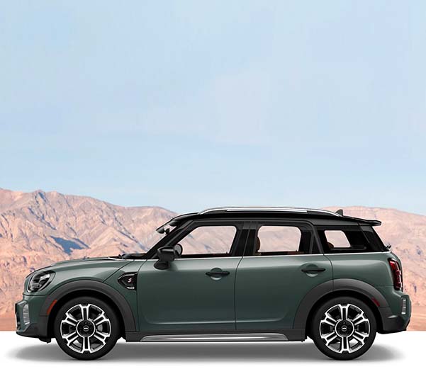 The MINI Countryman placed in front of a scenic background