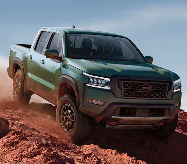 2023 Nissan Frontier off-road going down a steep incline.