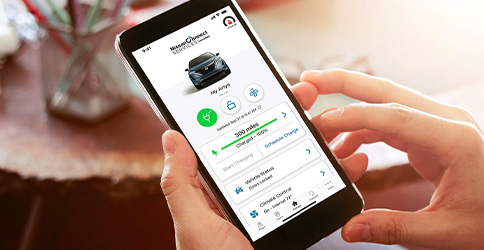 2022 Nissan ARIYA smartphone with NissanConnect app displayed