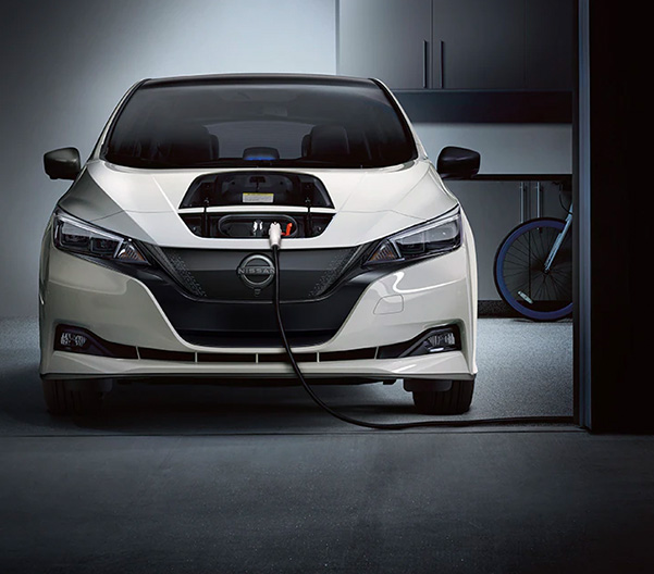 2023 Nissan LEAF charging up in a home garage
