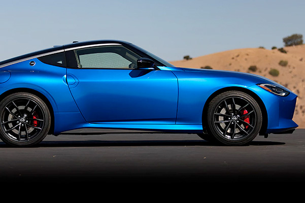 Side View Of Blue Metallic 2023 Nissan Z In The Desert