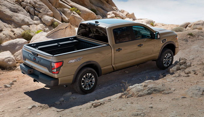 2023 Nissan Titan Driving along a Rural Road