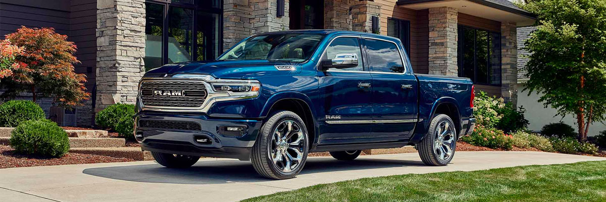 2023 RAM 1500 prked in front of a house